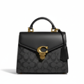 CARTERA DE PLASTICO NEGRO CON MANCHAS