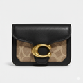 CARTERA DE PLASTICO NEGRO CON DORADO Y MANCHAS